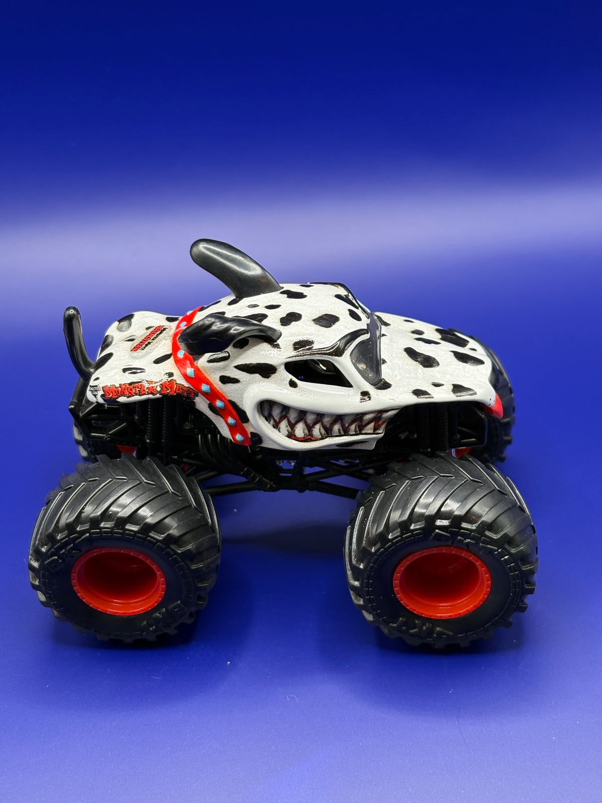 1ST EDITION - DALMATION - MONSTER JAM - RED RIMS - 1:64 SCALE - MINT